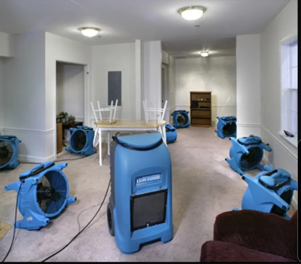 Air movers and dehumidifier setup for Water Damage Restoration in Merriam